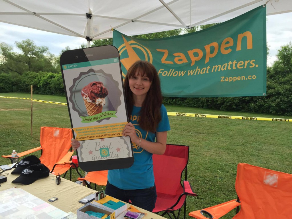 Intern Dominique at the Zappen Booth